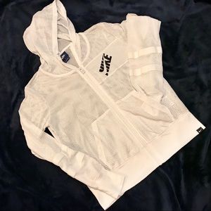 Women’s white, size medium Nike hoodie! Zip up.